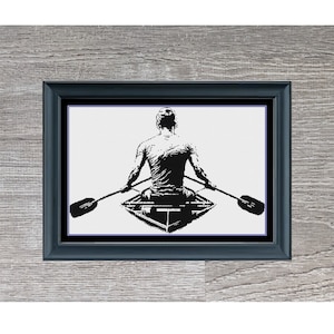 Peut inclure: Silhouette noire et blanche d'une personne faisant du canoë. L'image est encadrée et porte le texte "Rower Monochrome" en dessous.