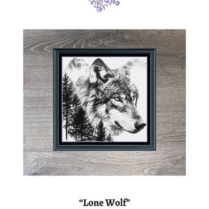 May include: Black and white framed artwork featuring a detailed illustration of a wolf's head, mountains, and pine trees. The artwork is titled "Lone Wolf" and measures 350 x 350.