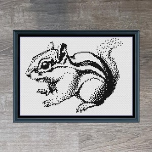 May include: Black and white cross-stitch pattern of a chipmunk, titled "Mini Chipmunk Monochrome". The pattern is 115 stitches wide by 87 stitches high and uses 1 DMC color.