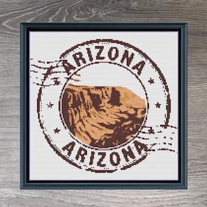 May include: Cross stitch pattern of a vintage style stamp with the word "Arizona" and a picture of a canyon. The pattern is 150 stitches wide by 136 stitches high and uses 5 DMC colors.