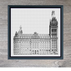 May include: A framed black and white cross-stitch pattern depicting Milwaukee City Hall. The image includes the text "Milwaukee City Hall" and the dimensions 320 x 319. The design is by Stitching Jules Design.