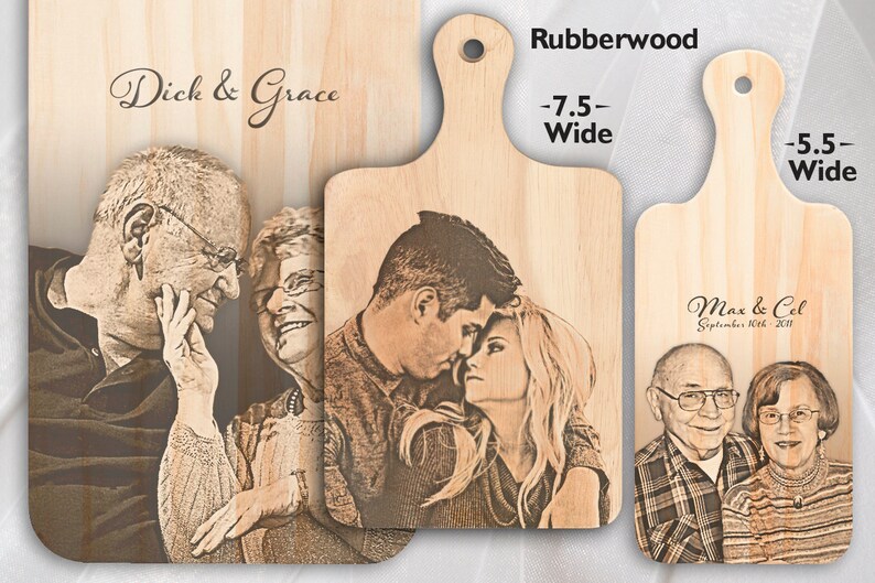 May include: Three personalised wooden chopping boards with engraved images of couples and their names. The boards are made of rubberwood and come in two sizes: 19 cm wide and 14 cm wide.