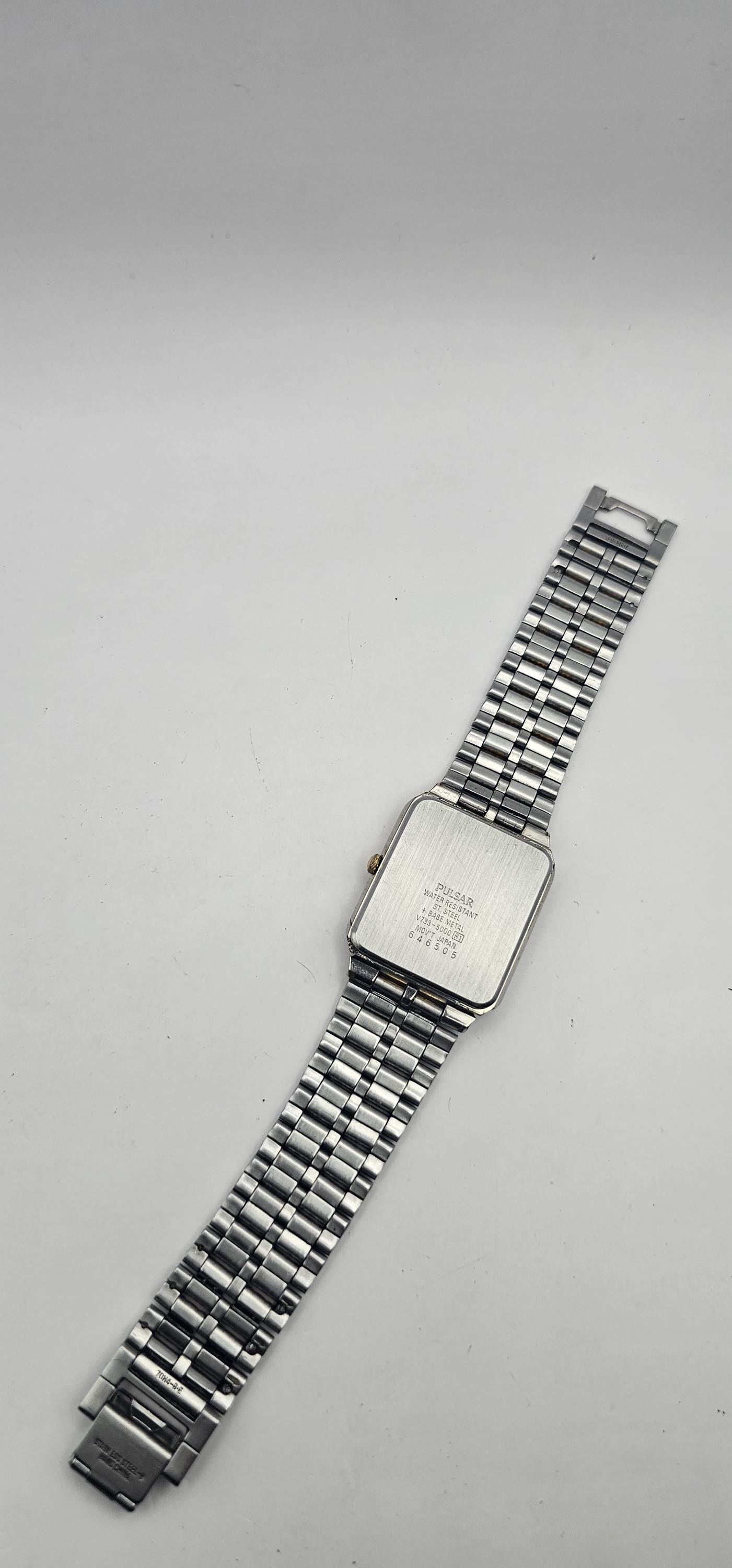 A Vintage Two Tone Gold/silver Tone Pulsar by Seiko Classic Men