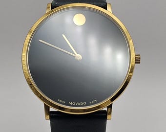 Reloj Movado Museum Classic – Tono dorado – Esfera negra – Cristal de zafiro – Fabricado en Suiza – Batería nueva – Regalo para él/ella