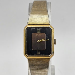Vintage Gold Tone Seiko Ladies Tank watch black dial  roman numerals REF 5420-5149, new battery, gift