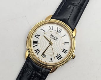 A Beautiful Vintage Bulova Gold Tone Ladies Date Watch  display picture 3