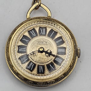 A Vintage Juvelin Roman Numeral Pocket Watch With Chain  display picture 2