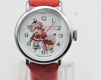 Vintage 1980er Jahre Strawberry Shortcake Armbanduhr, Handaufzug, rotes Band, Geschenk für Sie