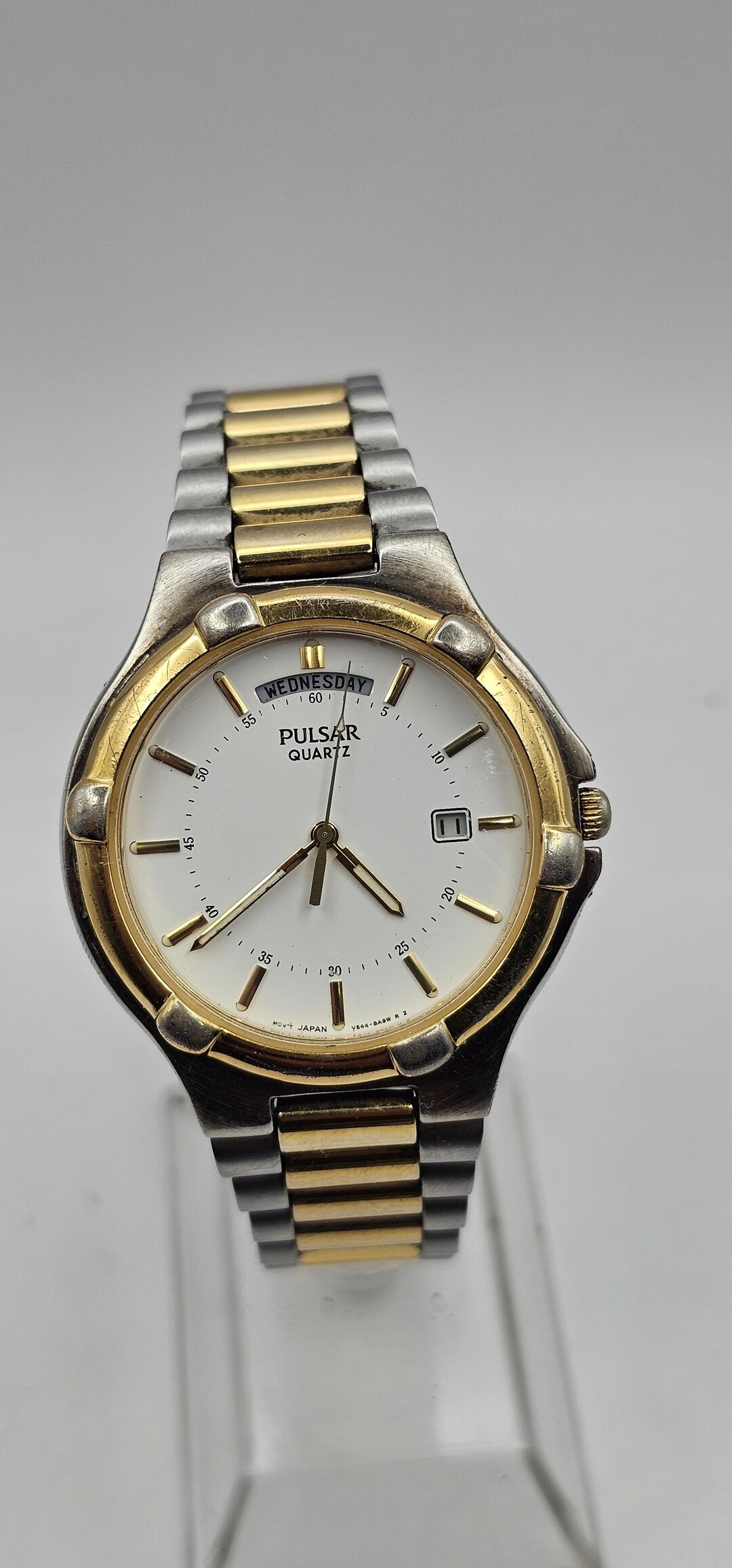 A Vintage Two Gold Tone Pulsar by Seiko Classic Mens Watch, White