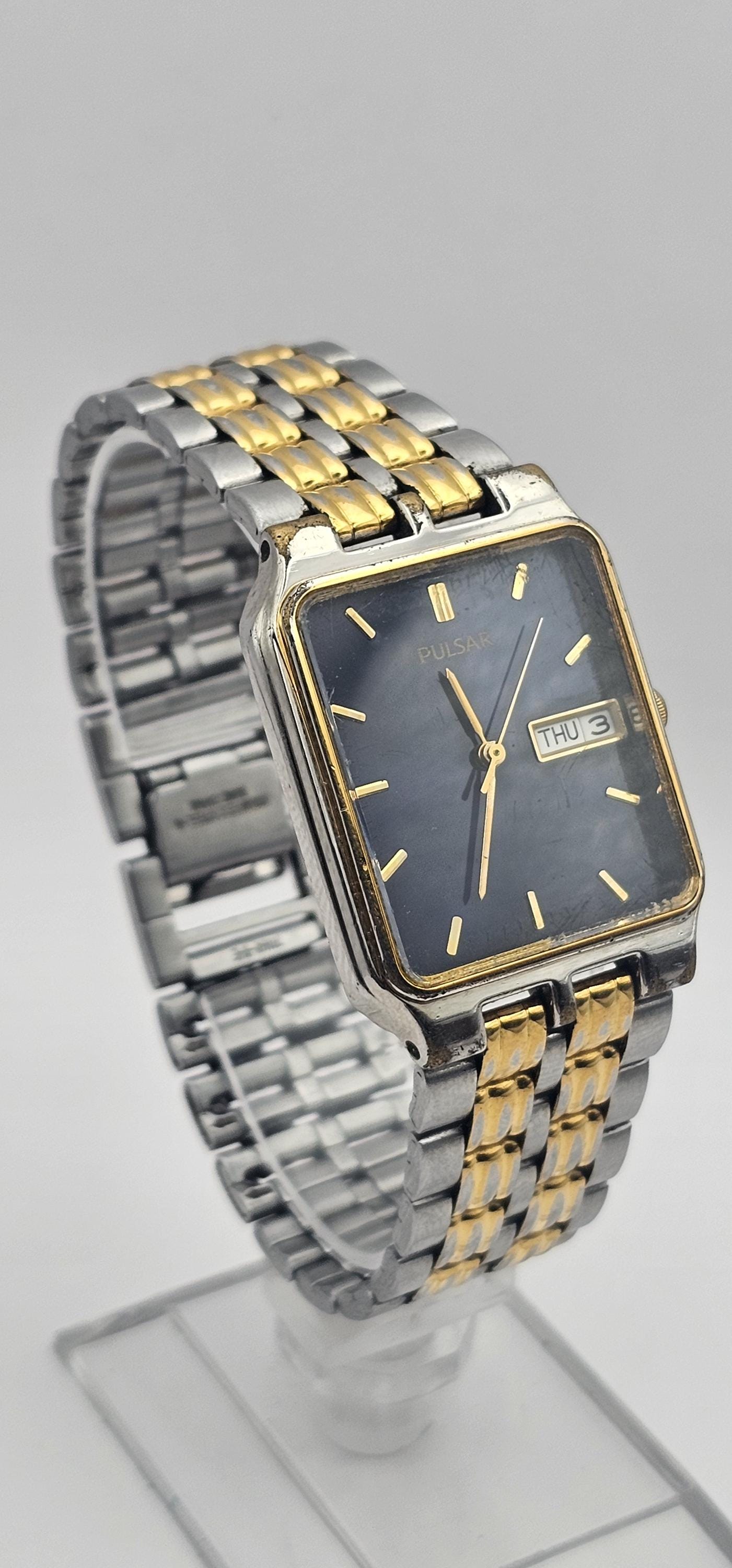 A Vintage Two Tone Gold/silver Tone Pulsar by Seiko Classic Men