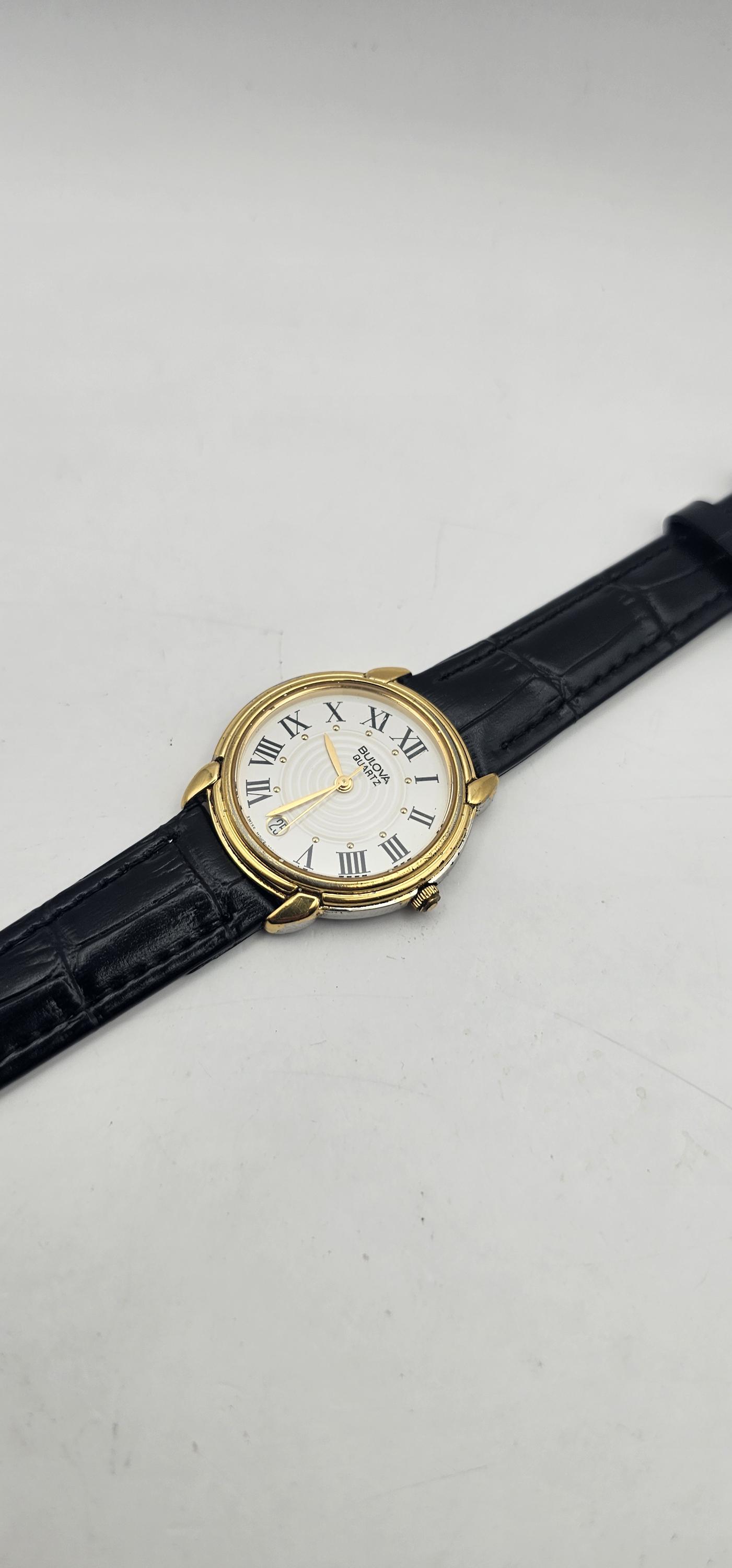 Vintage Bulova Quartz Women\'s Gold Tone White Dial Black Leather Watch Swiss Bulova - Gold-tone guilloché case white Roman dial - 1990s  main image 4