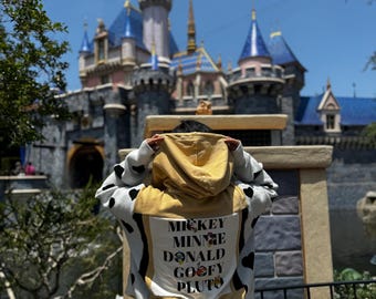 Disney Reworked sweatshirt using thrifted material. Yellow and black and white hearts
