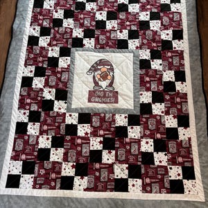 Aggies and Gnomes are in this Gig Em Gnomies quilt with Aggie prints and companion fabrics. Great for the dorm or tailgate!