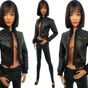 May include: A black quilted leather jacket with a zipper closure and silver studs. The jacket has a cropped style and is worn over a black top and black pants.