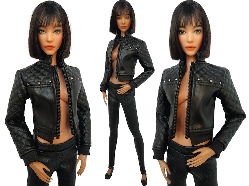 May include: A black quilted leather jacket with a zipper closure and silver studs. The jacket has a cropped style and is worn over a black top and black pants.