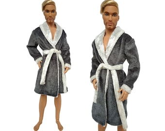 May include: A gray plush robe with a white faux fur collar and matching belt. The robe has a long, flowing design and is perfect for lounging around the house.