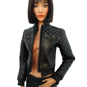 May include: A black leather jacket with a quilted design and silver studs. The jacket has a zipper closure and a ribbed knit collar, cuffs, and hem.