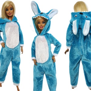 May include: A blue plush jumpsuit with a white belly and a hooded head with bunny ears. The hood has a white trim and a toothy grin.