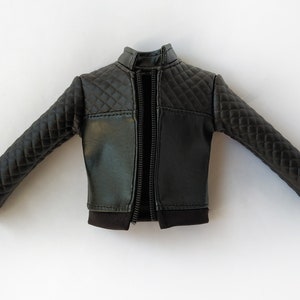 May include: A black quilted leather jacket with a zipper closure.