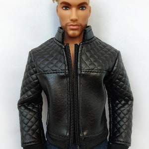 May include: A black quilted leather jacket with a zipper closure. The jacket has a stand-up collar and long sleeves.