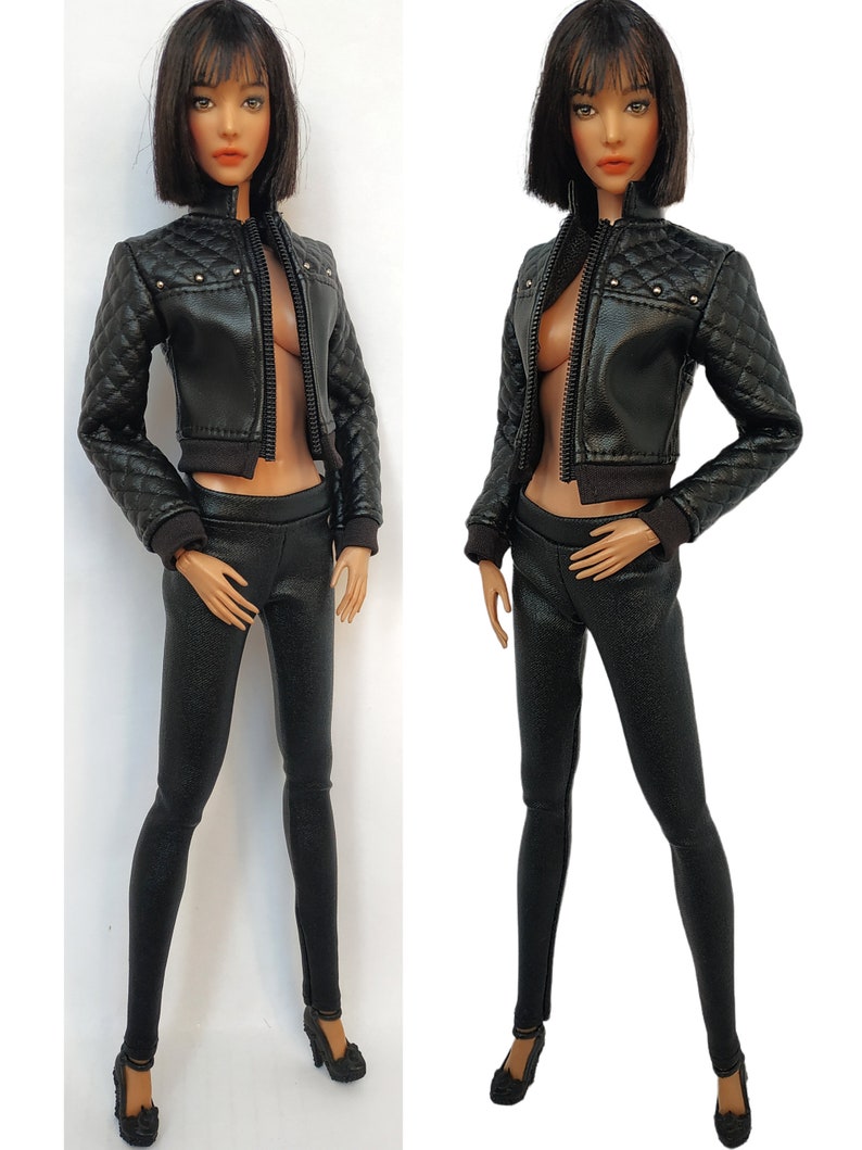 May include: A black leather jacket with a quilted design and a zipper closure. The jacket has a cropped length and features silver studs on the shoulders. The jacket is paired with black leather leggings and black heels.