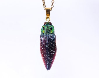 Handmade insect pendant made from real beetle Lampropepla rothschildi resin filled, The amethyst gem of Madagascar in jewelry