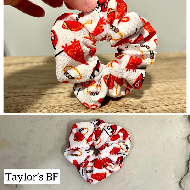 May include: White scrunchie with a red and yellow print of footballs, a football helmet, and the words "Let's Go!" and "PB+J".