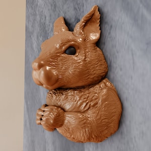 wall mounted squirrel head with arms, wall art