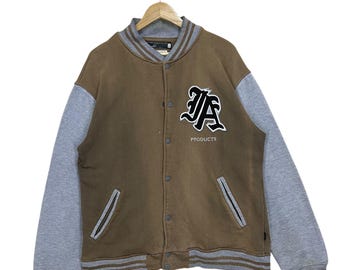 VÄLJ!! INVINCIBLEAR MURDA X Number Nine Varsity-jacka Storlek Medium