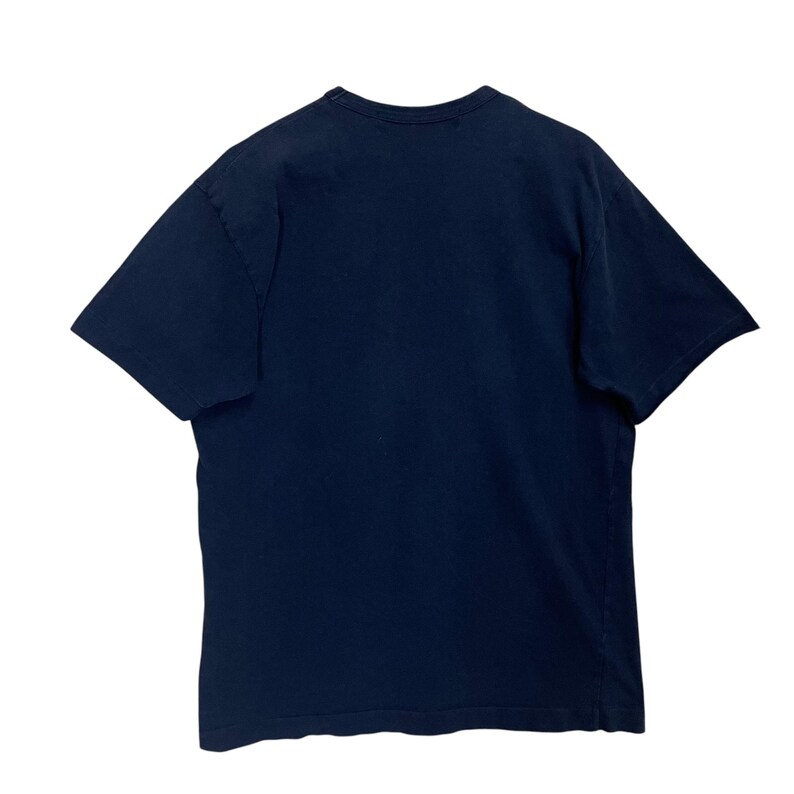 May include: A navy blue short-sleeve t-shirt. The shirt has a crew neck and is made of a soft, comfortable material. The t-shirt is a basic wardrobe staple.