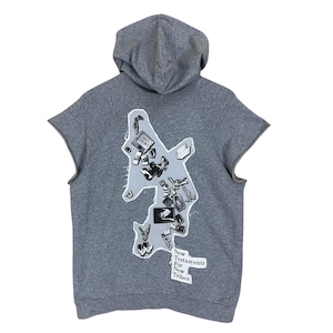 May include: Gray sleeveless hoodie with a hood. The back features a gray patch with various black and white images and the text "New Testaments For New Tribes". The hoodie is made of a soft, comfortable material.