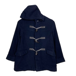 May include: A navy blue duffel coat with a hood and toggle fastenings. The coat has two front pockets and leather details on the toggles. The coat is made of a thick, textured fabric.