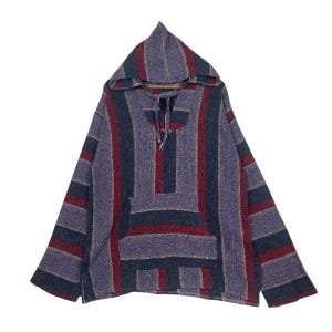 May include: A striped, hooded Baja hoodie in shades of purple, red, and blue. The pullover features a kangaroo pocket and a drawstring neckline. The fabric has a woven texture, and the design includes vertical stripes.