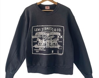 white levis sweater