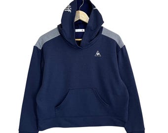 ¡ELIGE! Sudaderas con capucha Le Coq Sportif Suéter Le Coq Sportif Colección Golf Le Coq Sportif Sudaderas con capucha cortas con logo pequeño Talla M