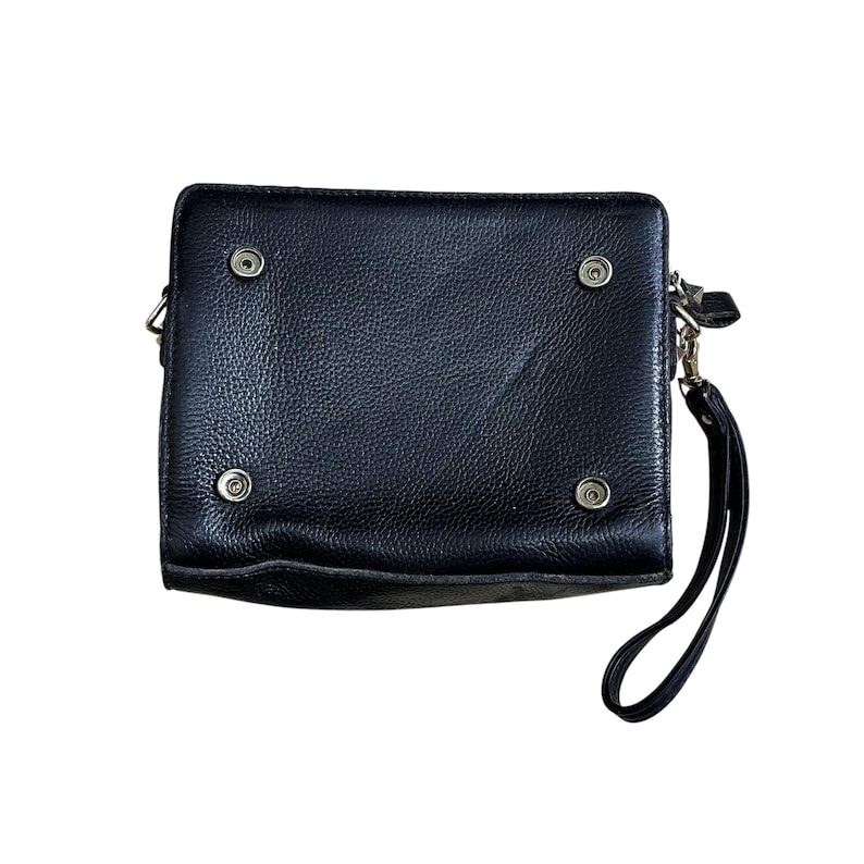 May include: Black leather clutch with a wrist strap. The rectangular bag has four metal snap closures and a silver-tone zipper. The leather has a textured appearance. The clutch is designed to be carried by hand.