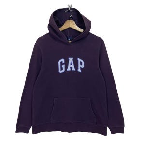 May include: A purple hooded sweatshirt with a large embroidered "GAP" logo in white and blue lettering.
