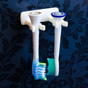 holder for toothbrush heads for Oral-B or Sonicare 2 Sonicare