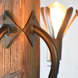 detail of wood beam for rustic chandelier