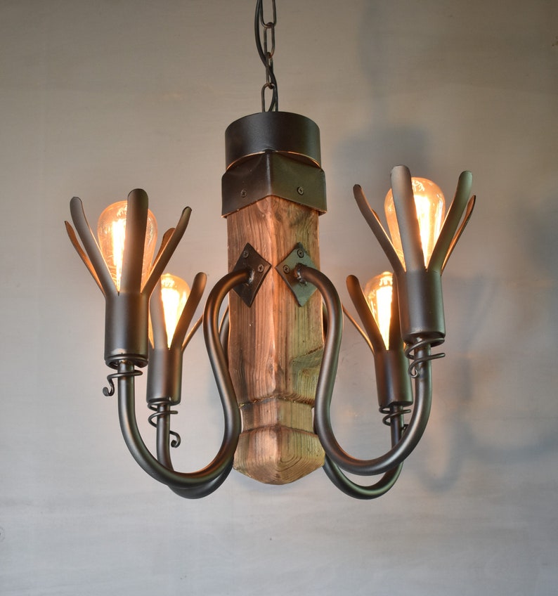 Wrought iron chandelier with wood beam