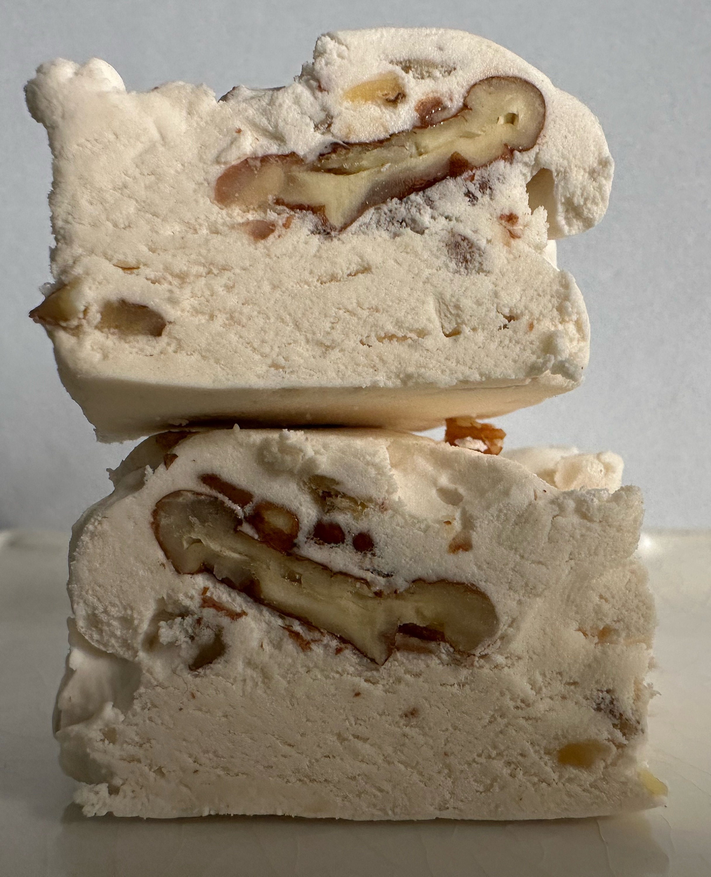 Old Fashioned Divinity candy with pecans. Light and fluffy!
