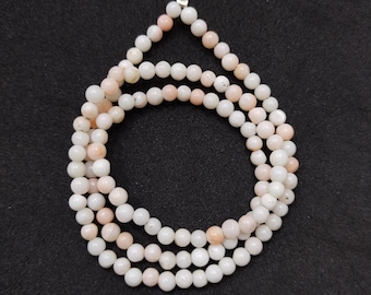 Cuentas de coral blanco japonés AAA: hilo de piedras preciosas redondas de 4 mm