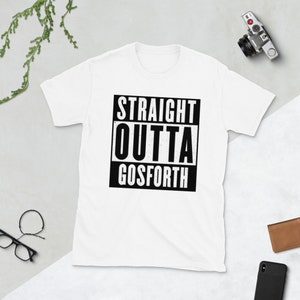 May include: White t-shirt with a black graphic that says "Straight Outta Gosforth".
