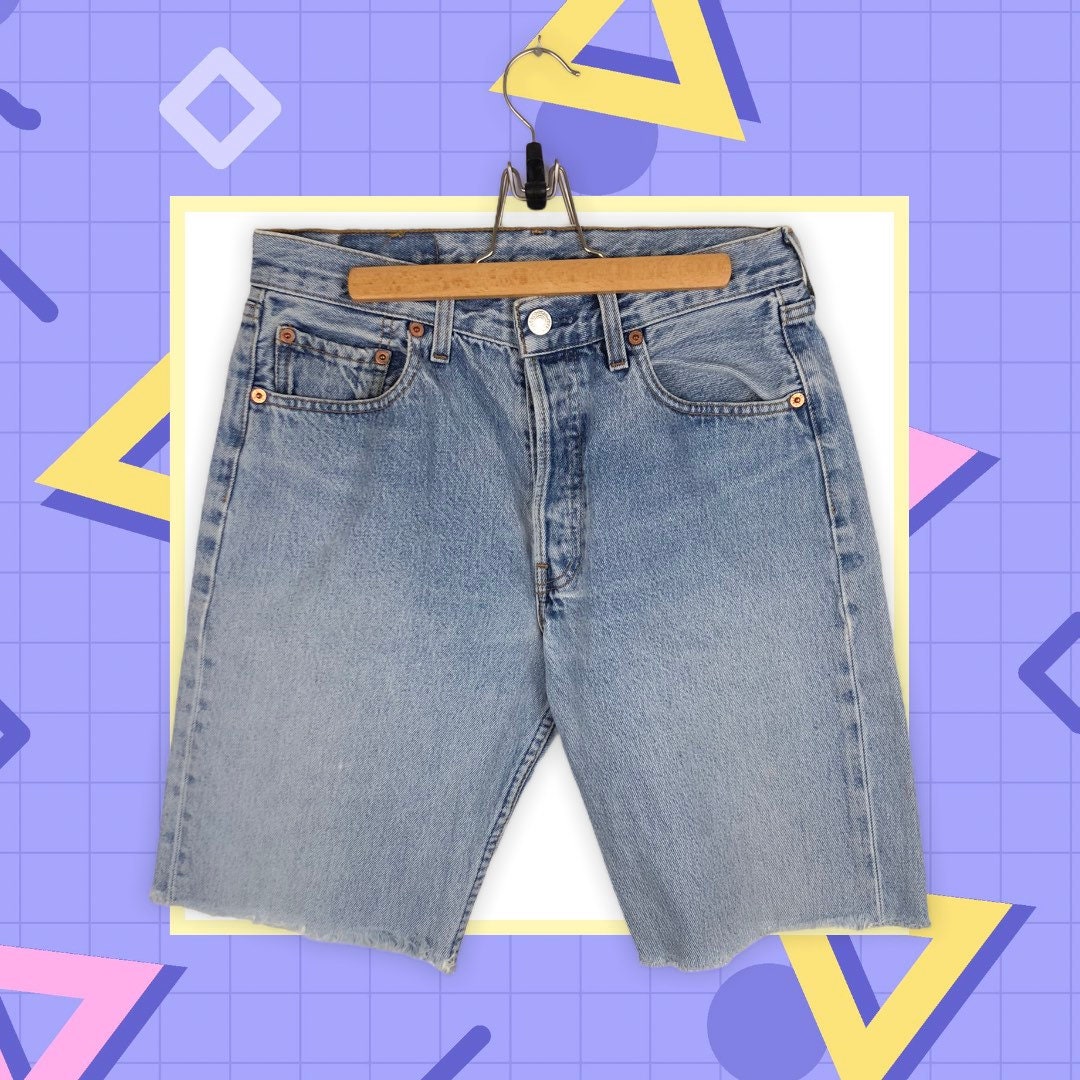 Levi's Strauss 80s 90s vintage kurze Jeans Hose mit ausgefransten Beinen und coolem washed Look blau size 31/34