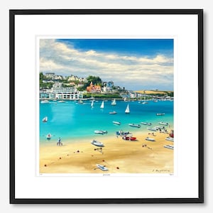 May include: A framed art print of a coastal scene. The artwork depicts a vibrant turquoise bay with boats, sailboats, and a sandy beach. Buildings line the shore under a blue sky with fluffy clouds. The artist's signature is visible.