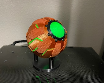 Green goblin pumpkin bomb with auto turn on flashing lights