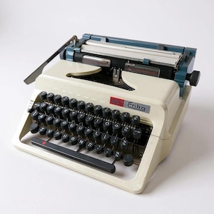 Máquina de escribir portátil Erika de mediados de siglo