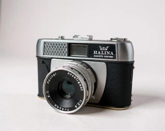 1970年代のヴィンテージ Petri FT 35 mm フィルムカメラ（革製ケース