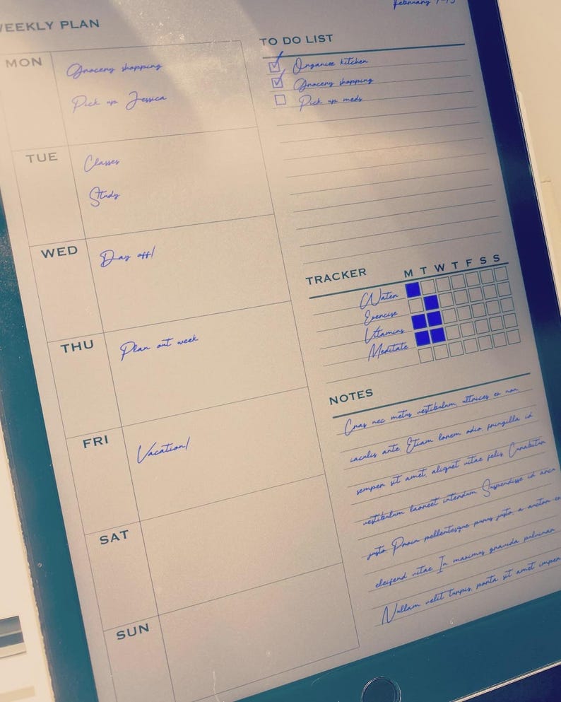 May include: A digital tablet displaying a weekly planner template with handwritten blue ink entries. The layout includes sections for a weekly plan, a to-do list with checkboxes, a habit tracker with blue filled squares, and a notes section with text.