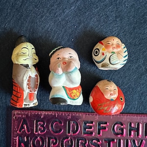4 Small Plaster Clay figures